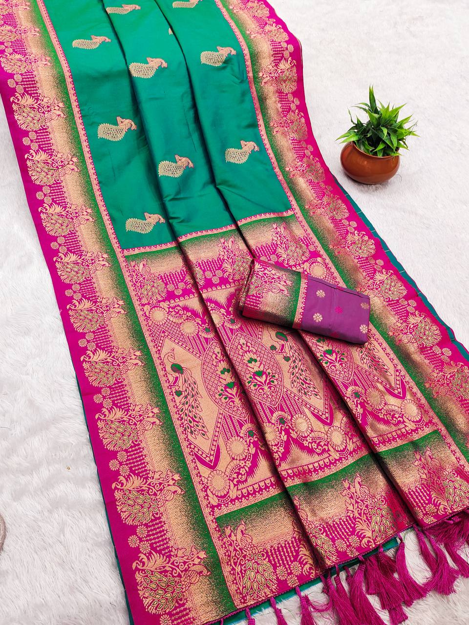 Emerald Green Banarasi Silk Saree with Rani Pink Zari Border & Peacock Motifs