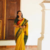 Elegant Mustard Yellow & Forest Green Kanchipuram Silk Saree with Traditional Peacock Zari Border