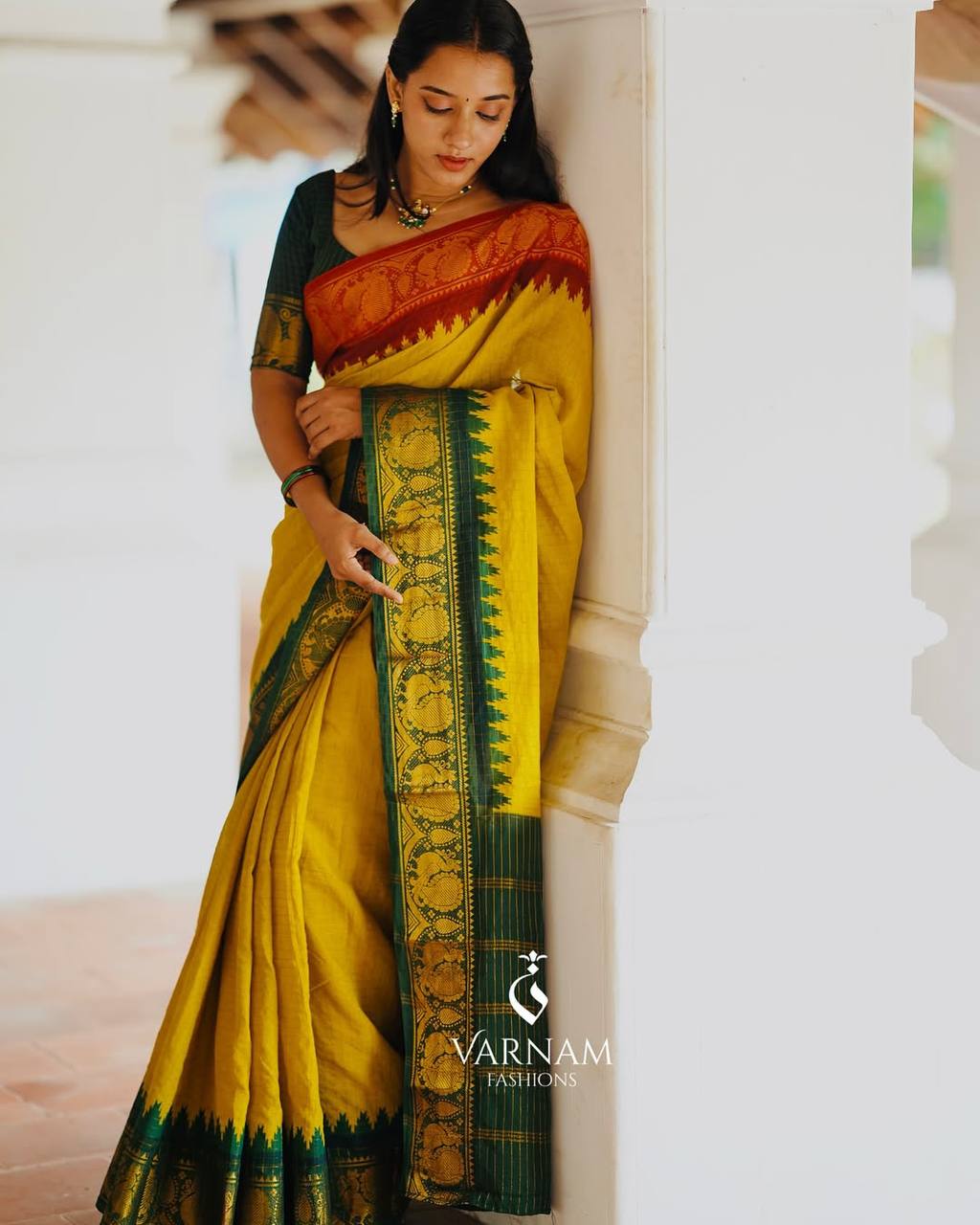 Elegant Mustard Yellow & Forest Green Kanchipuram Silk Saree with Traditional Peacock Zari Border
