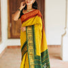 Elegant Mustard Yellow & Forest Green Kanchipuram Silk Saree with Traditional Peacock Zari Border