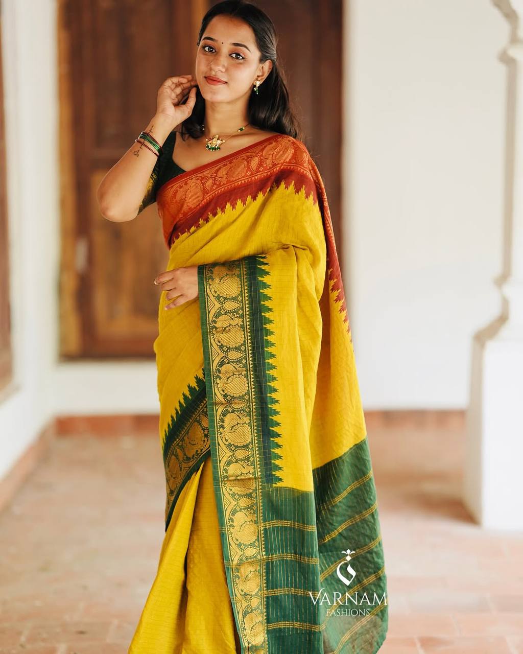 Elegant Mustard Yellow & Forest Green Kanchipuram Silk Saree with Traditional Peacock Zari Border