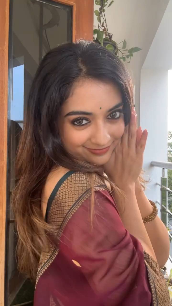 Deep Wine Chanderi Saree with Emerald Green Halter Neck Blouse