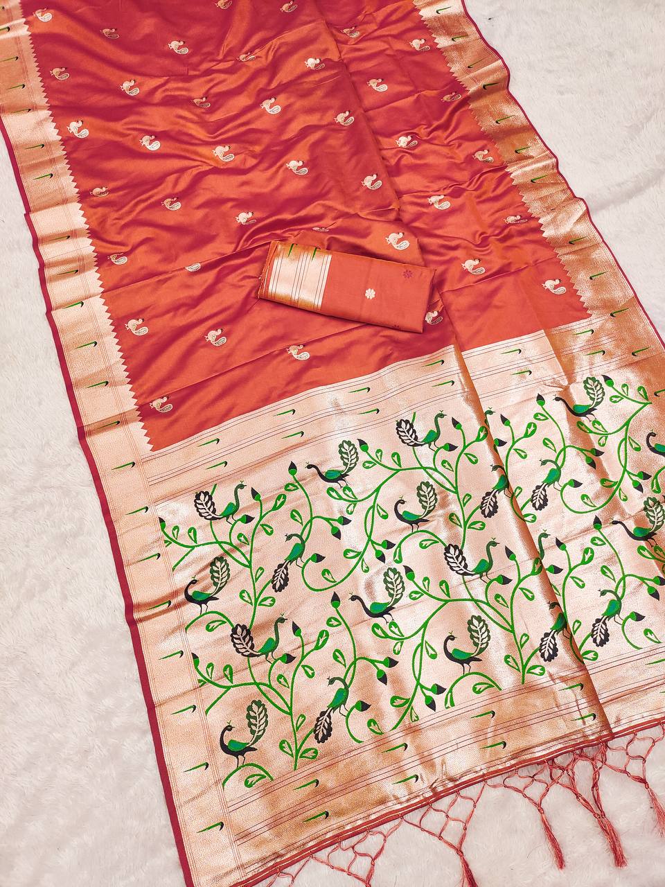 Burnt Orange Silk Saree with Handcrafted Peacock & Floral Zari Border