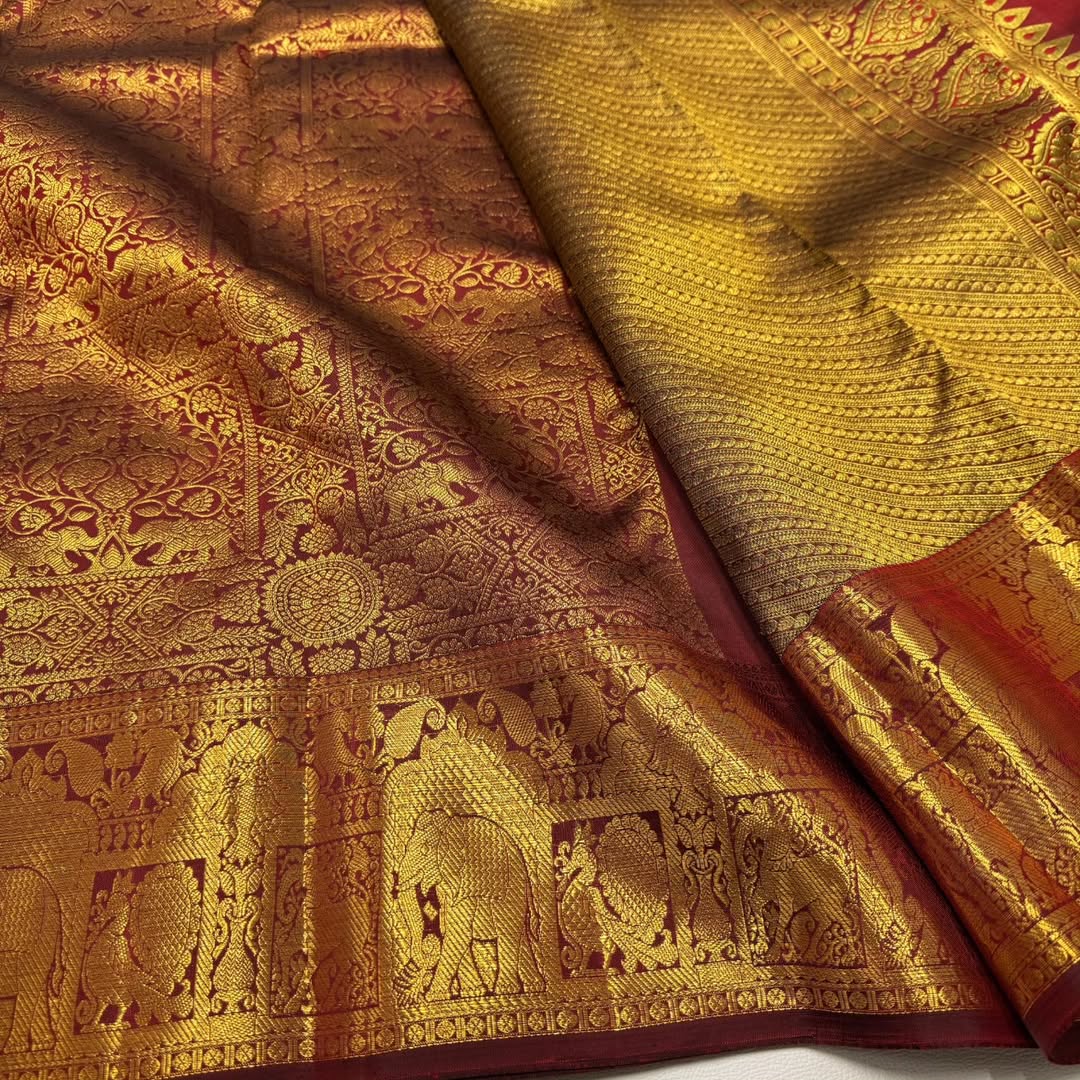 Grand Bridal Maroon Banarasi Silk Saree with All-Over Zari Weaving & Royal Elephant Border | Premium Wedding Wear