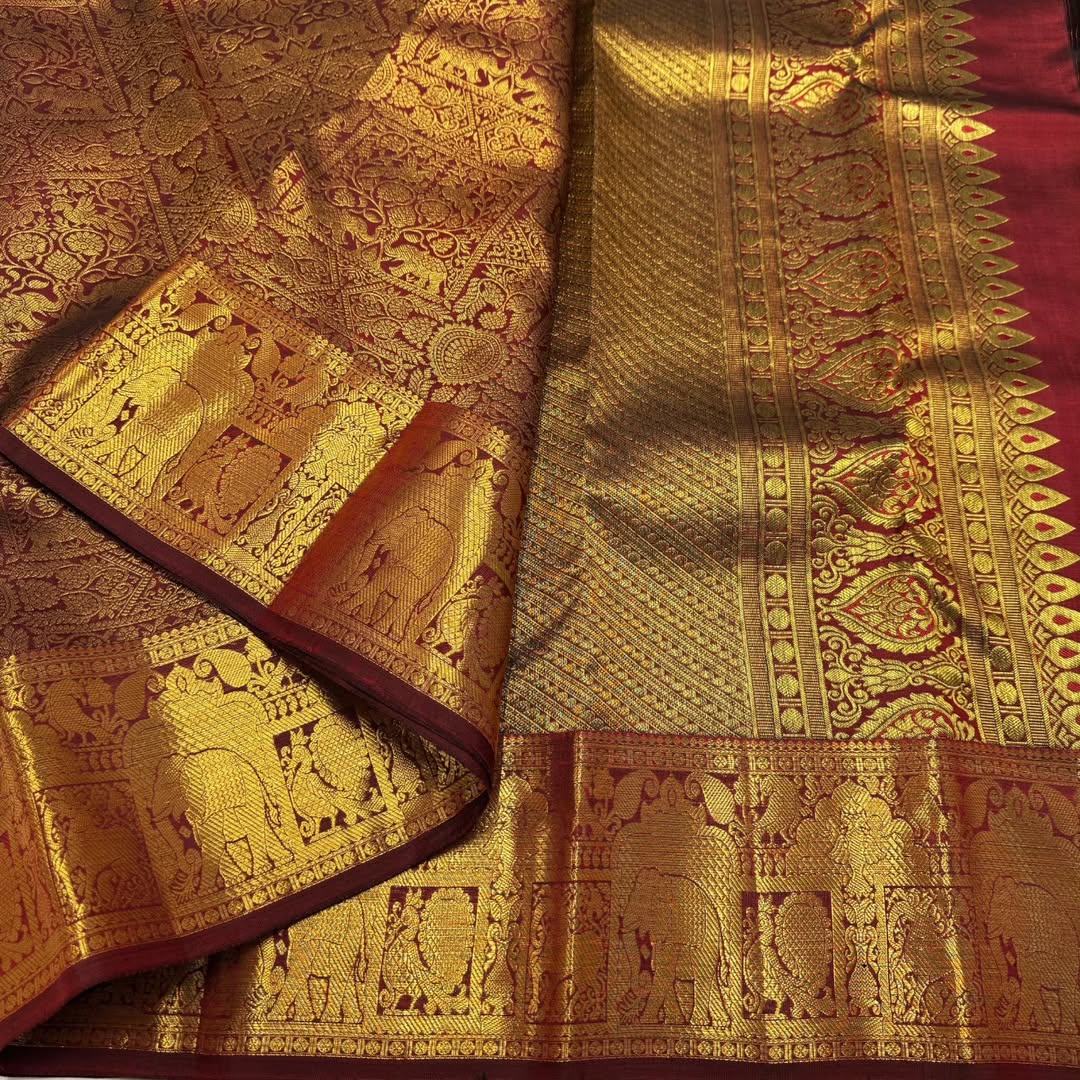 Grand Bridal Maroon Banarasi Silk Saree with All-Over Zari Weaving & Royal Elephant Border | Premium Wedding Wear