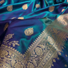 Blue Satin Silk Saree with Rich Golden Zari Border and Floral Motifs
